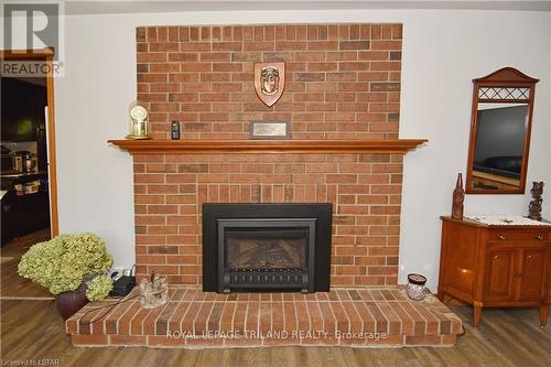 9685 Army Camp Road, Lambton Shores, ON - Indoor Photo Showing Living Room With Fireplace