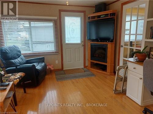 231 Pebble Beach Parkway, South Huron (Stephen Twp), ON - Indoor Photo Showing Living Room With Fireplace