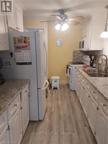 231 Pebble Beach Parkway, South Huron (Stephen Twp), ON - Indoor Photo Showing Kitchen With Double Sink