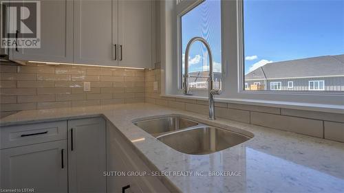 27 Lois Court, Lambton Shores, ON - Indoor Photo Showing Kitchen With Double Sink