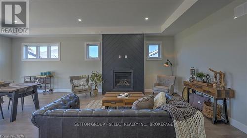27 Lois Court, Lambton Shores, ON - Indoor Photo Showing Living Room With Fireplace