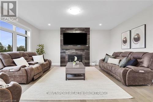 151 Mcleod Street Street, North Middlesex, ON - Indoor Photo Showing Living Room With Fireplace