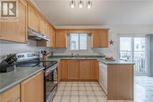 20 - 335 Lighthouse Road, London, ON - Indoor Photo Showing Kitchen With Double Sink