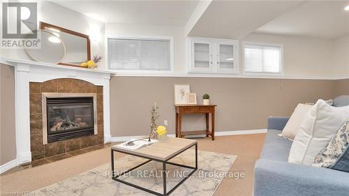 1523 Portrush Way, London, ON - Indoor Photo Showing Living Room With Fireplace