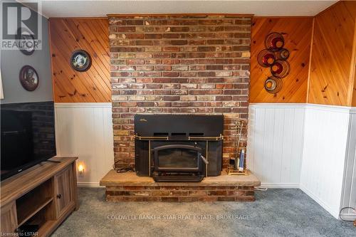 6805 King Street, Plympton-Wyoming, ON - Indoor Photo Showing Living Room With Fireplace