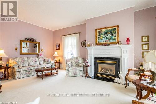 3608 Concession Drive, Southwest Middlesex, ON - Indoor Photo Showing Living Room With Fireplace