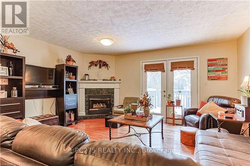 8 - 275 Wonham Street, Ingersoll, ON - Indoor Photo Showing Living Room With Fireplace