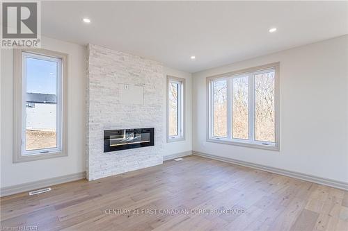 104 Greene Street, South Huron, ON - Indoor Photo Showing Other Room With Fireplace