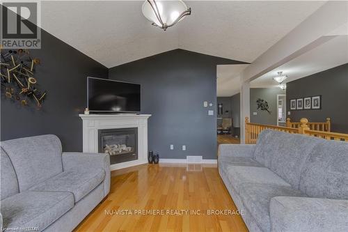 39 Dannecker Road, Stratford, ON - Indoor Photo Showing Living Room With Fireplace