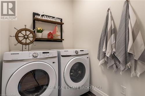 24 - 63 Compass Trail, Central Elgin, ON - Indoor Photo Showing Laundry Room