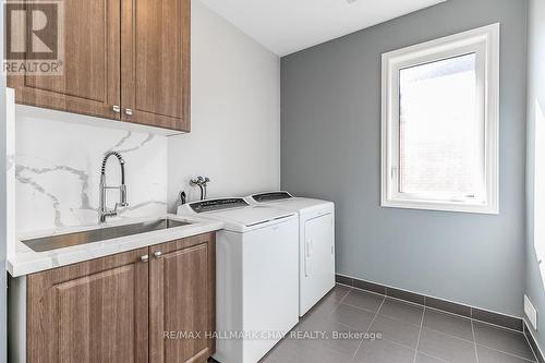 42 Trail Boulevard, Springwater, ON - Indoor Photo Showing Laundry Room
