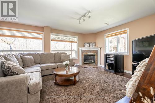 44 Nicklaus Drive, Barrie, ON - Indoor Photo Showing Living Room With Fireplace