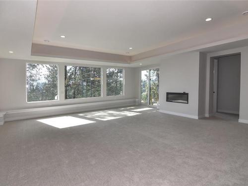 2021 Spyglass Way, West Kelowna, BC - Indoor Photo Showing Other Room With Fireplace