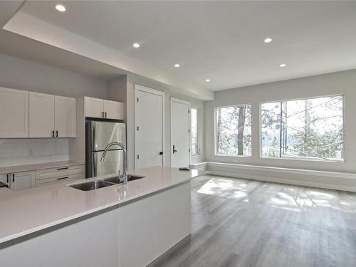 2021 Spyglass Way, West Kelowna, BC - Indoor Photo Showing Kitchen With Double Sink