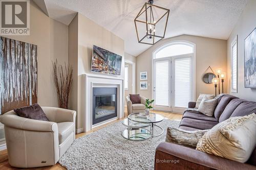 64 Sumersford Drive, Clarington, ON - Indoor Photo Showing Living Room With Fireplace