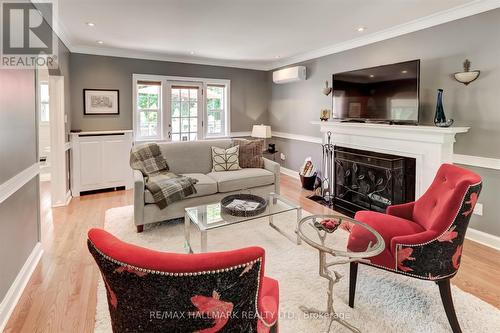 105 Cliffcrest Drive, Toronto, ON - Indoor Photo Showing Living Room With Fireplace