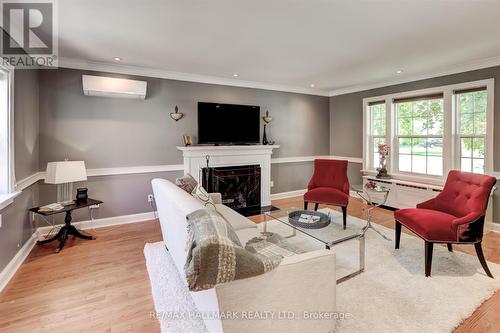 105 Cliffcrest Drive, Toronto, ON - Indoor Photo Showing Living Room With Fireplace