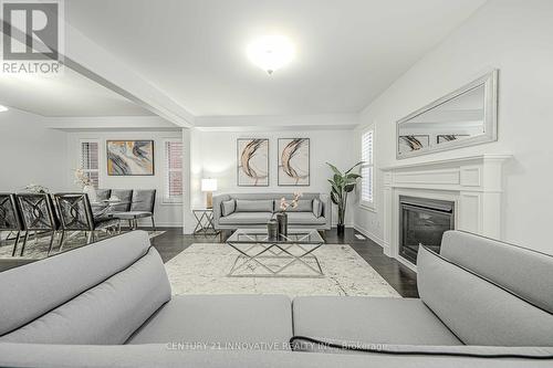 95 Bridlewood Boulevard, Whitby, ON - Indoor Photo Showing Living Room With Fireplace