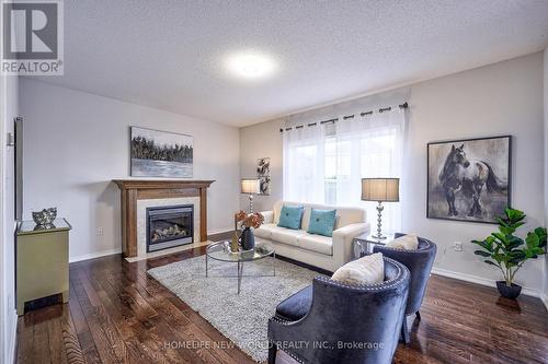 1402 Kellough Street, Innisfil, ON - Indoor Photo Showing Living Room With Fireplace