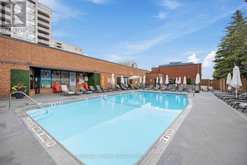 303 - 9015 Leslie Street, Richmond Hill, ON - Outdoor With In Ground Pool