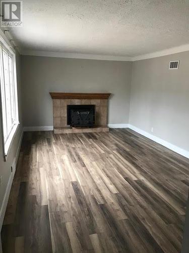 34 Walsh Street, Moncton, NB - Indoor Photo Showing Living Room With Fireplace