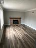 34 Walsh Street, Moncton, NB  - Indoor Photo Showing Living Room With Fireplace 