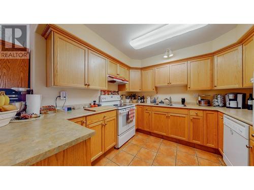 9307 62Nd Avenue Unit# 205, Osoyoos, BC - Indoor Photo Showing Kitchen With Double Sink