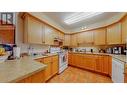 9307 62Nd Avenue Unit# 205, Osoyoos, BC  - Indoor Photo Showing Kitchen With Double Sink 