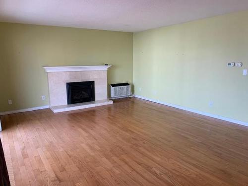 310-411 Nicola Street, Kamloops, BC - Indoor Photo Showing Living Room With Fireplace