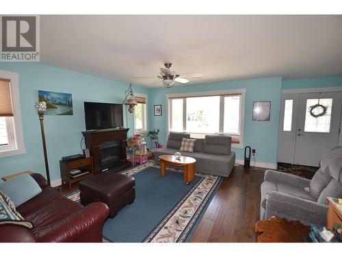 683 Cougar Street, Vernon, BC - Indoor Photo Showing Living Room With Fireplace