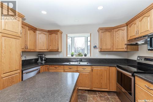 210 Haslam Court, Saskatoon, SK - Indoor Photo Showing Kitchen With Stainless Steel Kitchen With Double Sink