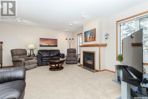 210 Haslam Court, Saskatoon, SK - Indoor Photo Showing Living Room With Fireplace