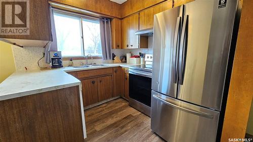 132 Haw Place, Swift Current, SK - Indoor Photo Showing Kitchen With Double Sink