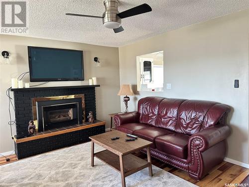 101 Otter Place, Beaver Flat, SK - Indoor Photo Showing Living Room With Fireplace