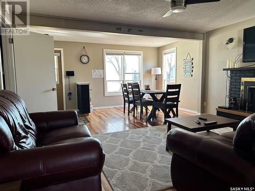 101 Otter Place, Beaver Flat, SK - Indoor Photo Showing Living Room With Fireplace