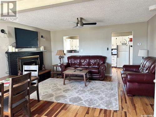 101 Otter Place, Beaver Flat, SK - Indoor Photo Showing Living Room With Fireplace