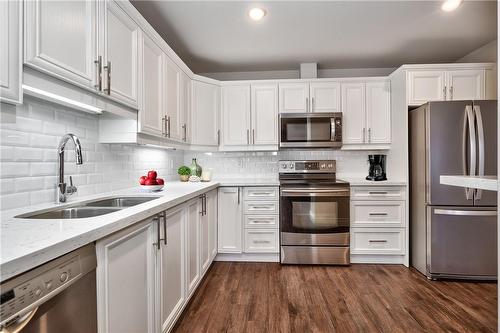 Virtually Staged - 1477 Lakeshore Road|Unit #305, Burlington, ON - Indoor Photo Showing Kitchen With Stainless Steel Kitchen With Double Sink With Upgraded Kitchen