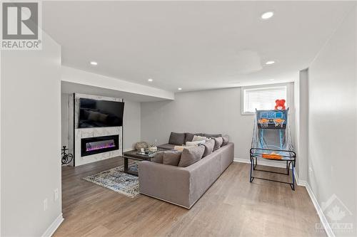 165 Angelonia Crescent, Gloucester, ON - Indoor With Fireplace