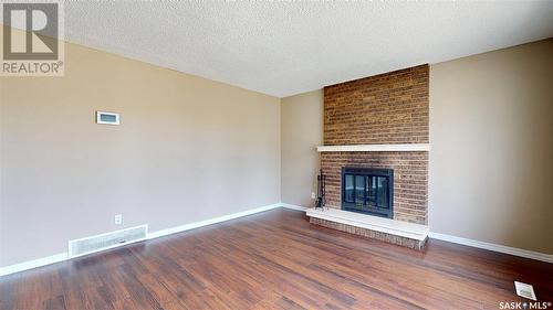 3 Markwell Drive, Regina, SK - Indoor Photo Showing Other Room With Fireplace