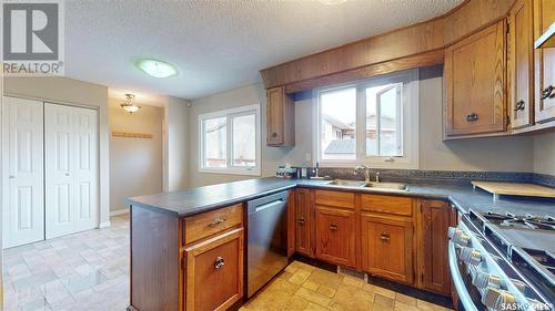 3 Markwell Drive, Regina, SK - Indoor Photo Showing Kitchen With Double Sink