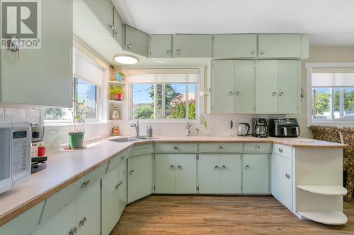 875/877 Jones Street, Kelowna, BC - Indoor Photo Showing Kitchen With Double Sink