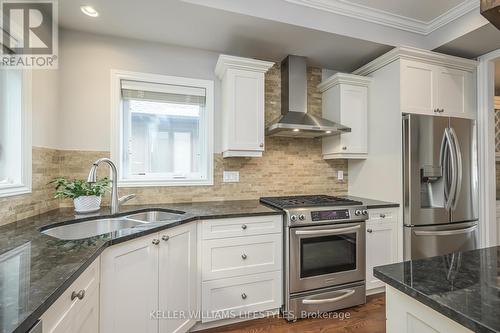 19 Caverhill Crescent, Middlesex Centre, ON - Indoor Photo Showing Kitchen With Double Sink With Upgraded Kitchen