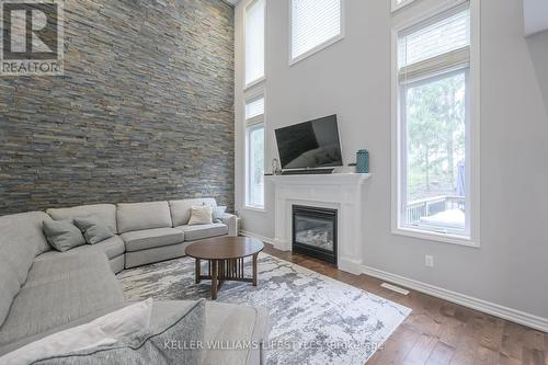 19 Caverhill Crescent, Middlesex Centre, ON - Indoor Photo Showing Living Room With Fireplace