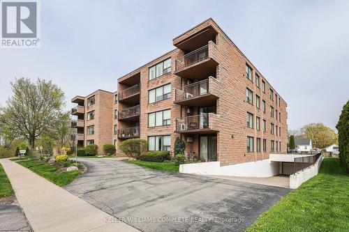 401 - 28 Robinson Street N, Grimsby, ON - Outdoor With Balcony With Facade
