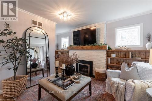 4512 Colonel Talbot Road, London, ON - Indoor Photo Showing Living Room With Fireplace