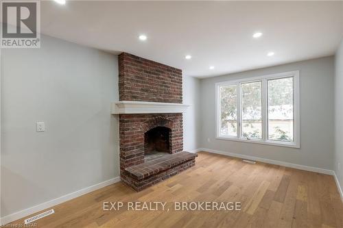 614 Chiddington Avenue, London, ON - Indoor With Fireplace
