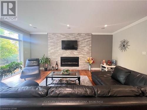 2084 North Routledge Park, London, ON - Indoor Photo Showing Living Room With Fireplace