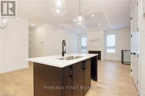 2 - 108 Coastal Crescent, Lambton Shores, ON - Indoor Photo Showing Kitchen With Double Sink