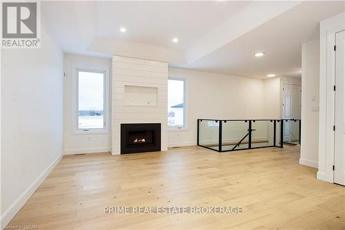 2 - 108 Coastal Crescent, Lambton Shores, ON - Indoor With Fireplace