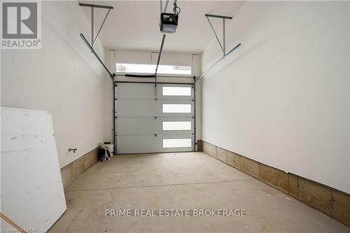 1 - 110 Coastal Crescent, Lambton Shores (Grand Bend), ON - Indoor Photo Showing Garage